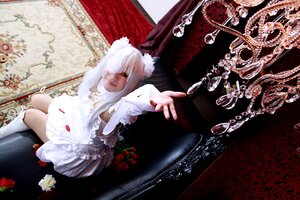 Rating: Safe Score: 0 Tags: 1girl blue_eyes dress flower kirakishou lips outstretched_hand rose sitting solo white_dress white_hair User: admin