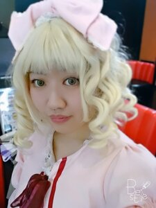 Rating: Safe Score: 0 Tags: 1girl artist_name bangs blonde_hair blurry blurry_background blurry_foreground closed_mouth curly_hair depth_of_field eyelashes green_eyes hat hinaichigo jewelry lips looking_at_viewer photo portrait realistic signature smile solo upper_body User: admin
