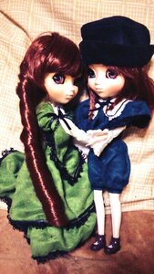 Rating: Safe Score: 0 Tags: 2girls bangs brown_hair doll dress green_dress hat long_hair long_sleeves looking_at_viewer multiple_dolls multiple_girls pantyhose purple_eyes short_hair standing tagme white_legwear User: admin