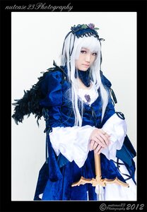 Rating: Safe Score: 0 Tags: 1girl bangs black_border border dress flower jewelry long_hair long_sleeves looking_at_viewer ring solo suigintou white_hair User: admin