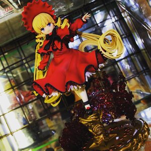 Rating: Safe Score: 0 Tags: 1girl blonde_hair blue_eyes blurry bonnet bow bowtie capelet doll dress drill_hair frills full_body long_hair long_sleeves looking_at_viewer railing red_dress shinku shoes solo standing twintails very_long_hair User: admin