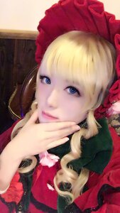 Rating: Safe Score: 0 Tags: 1girl bangs blonde_hair blue_eyes bonnet flower hands lips looking_at_viewer rose shinku solo User: admin