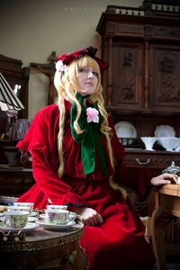 Rating: Safe Score: 0 Tags: 1girl blonde_hair blue_eyes bonnet book dress flower long_hair long_sleeves red_dress rose shinku sitting solo teacup User: admin