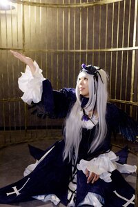 Rating: Safe Score: 0 Tags: 1girl dress frills indoors lips long_hair long_sleeves outstretched_arm sitting solo suigintou wings User: admin