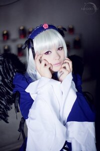 Rating: Safe Score: 0 Tags: 1girl bangs blurry depth_of_field dress flower frills hairband lips long_hair long_sleeves looking_at_viewer purple_eyes rose silver_hair smile solo suigintou User: admin