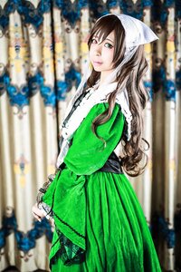 Rating: Safe Score: 0 Tags: 1girl blue_eyes blurry blurry_background blurry_foreground brown_hair depth_of_field dress green_dress heterochromia long_hair long_sleeves looking_at_viewer motion_blur photo solo stained_glass standing suiseiseki User: admin