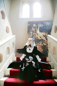 Rating: Safe Score: 0 Tags: 1boy 1girl cape coat indoors solo standing suigintou white_hair window User: admin