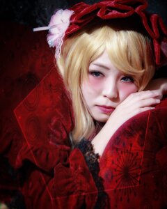 Rating: Safe Score: 0 Tags: 1girl blonde_hair blue_eyes fan flower hat lips looking_at_viewer ribbon shinku smile solo yakumo_yukari User: admin