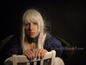 Rating: Safe Score: 0 Tags: 1girl bangs black_background blonde_hair choker closed_mouth lips long_hair long_sleeves looking_at_viewer own_hands_together realistic solo suigintou upper_body User: admin