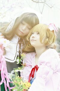 Rating: Safe Score: 0 Tags: 2girls blonde_hair blurry dress flower hair_ribbon lips long_hair multiple_cosplay multiple_girls necklace ribbon striped tagme User: admin