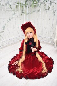 Rating: Safe Score: 0 Tags: 1girl blonde_hair bonnet curtains dress flower long_hair red_dress rose shinku sitting solo User: admin