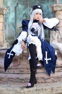 Rating: Safe Score: 0 Tags: 1girl bangs black_legwear boots dress frills lace lips long_hair long_sleeves photo sitting solo suigintou thighhighs weapon User: admin