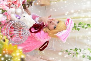 Rating: Safe Score: 0 Tags: 1girl bangs basket birdcage blonde_hair blue_eyes bow dress flower hair_bow hinaichigo indoors looking_at_viewer pink_bow pink_dress plant potted_plant rose sitting solo vase User: admin
