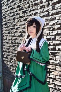 Rating: Safe Score: 0 Tags: 1girl bangs black_eyes black_hair brick_wall dress green_dress hat holding long_hair long_sleeves looking_at_viewer outdoors smile solo standing suiseiseki User: admin