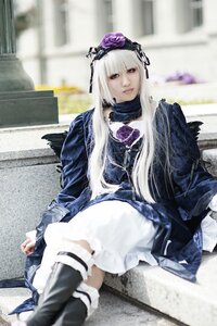 Rating: Safe Score: 0 Tags: 1girl black_legwear blurry blurry_background blurry_foreground boots depth_of_field dress frills gothic_lolita long_hair long_sleeves looking_at_viewer photo sitting solo suigintou thighhighs User: admin