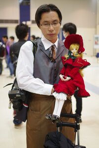 Rating: Safe Score: 0 Tags: black_hair blonde_hair blurry blurry_background blurry_foreground depth_of_field doll dress figure glasses hat long_sleeves multiple_boys photo sakurada_jun shinku sitting solo standing vest white_legwear User: admin