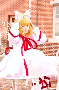 Rating: Safe Score: 0 Tags: 1girl blonde_hair dress green_eyes hinaichigo long_sleeves ribbon short_hair solo standing white_dress User: admin