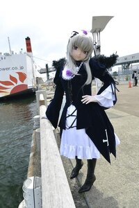 Rating: Safe Score: 0 Tags: 1girl black_footwear boots dress flower hair_ornament hand_on_hip jewelry knee_boots looking_at_viewer purple_eyes solo standing suigintou User: admin