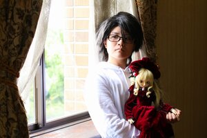 Rating: Safe Score: 0 Tags: 1boy 1girl black_hair blonde_hair doll dress glasses indoors long_hair long_sleeves red_dress shinku solo window User: admin