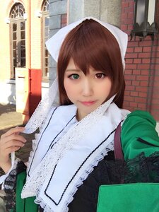 Rating: Safe Score: 0 Tags: 1girl brick_wall brown_hair building green_eyes heterochromia lips looking_at_viewer outdoors photo smile solo suiseiseki upper_body User: admin