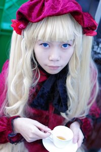 Rating: Safe Score: 0 Tags: 1girl bangs blonde_hair blue_eyes blunt_bangs blurry blurry_background bow closed_mouth cup depth_of_field eyelashes hat holding holding_cup lips long_hair looking_at_viewer saucer shinku solo tea teacup upper_body User: admin