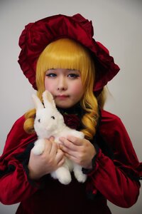 Rating: Safe Score: 0 Tags: 1girl animal bangs blonde_hair blue_eyes blunt_bangs bonnet cat dress drill_hair flower grey_background holding holding_animal lips long_hair long_sleeves realistic red_flower red_rose rose shinku solo upper_body User: admin