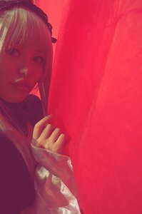 Rating: Safe Score: 0 Tags: 1girl long_hair red_background red_theme solo suigintou upper_body User: admin