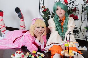 Rating: Safe Score: 0 Tags: 2girls aqua_hair blonde_hair cake flower food fork fruit hatsune_miku lips long_hair multiple_cosplay multiple_girls pantyhose realistic strawberry striped_legwear tagme User: admin