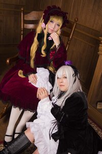 Rating: Safe Score: 0 Tags: 2girls blonde_hair blue_eyes dress flower frills lips long_hair multiple_cosplay multiple_girls shinku sitting tagme User: admin