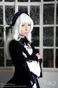 Rating: Safe Score: 0 Tags: 1girl crossed_arms dress hat indoors lips long_hair long_sleeves red_eyes ribbon solo suigintou white_hair User: admin