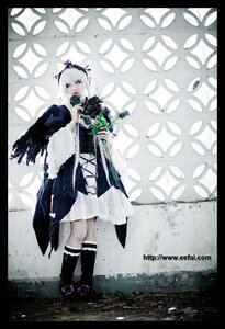 Rating: Safe Score: 0 Tags: 1girl black_border border dress flower hairband letterboxed pillarboxed silver_hair solo suigintou windowboxed User: admin