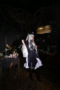 Rating: Safe Score: 0 Tags: dark dress flower hat long_hair multiple_girls nurse_cap solo suigintou very_long_hair yagokoro_eirin User: admin