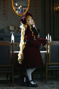 Rating: Safe Score: 0 Tags: 1girl blonde_hair blue_eyes bonnet bow cat dress flower indoors long_hair looking_at_viewer red_dress rose shinku shoes solo standing User: admin