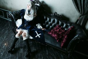 Rating: Safe Score: 0 Tags: 1girl bandages closed_eyes doll_joints dress flower frills gothic_lolita hairband long_hair long_sleeves silver_hair sitting solo suigintou water white_hair wings User: admin
