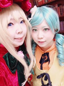 Rating: Safe Score: 0 Tags: 2girls aqua_hair blonde_hair blue_eyes bow choker fur_trim green_eyes hair_bow lips long_hair looking_at_viewer multiple_cosplay multiple_girls portrait ribbon smile tagme User: admin