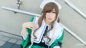 Rating: Safe Score: 0 Tags: 1girl brown_hair dress green_dress hair_over_one_eye hat lips long_hair long_sleeves nurse_cap solo suiseiseki upper_body User: admin