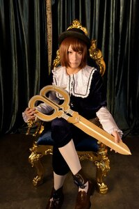 Rating: Safe Score: 0 Tags: 1girl bangs black_shorts boots brown_eyes brown_footwear brown_hair closed_mouth hat instrument long_sleeves looking_at_viewer short_hair sitting solo souseiseki User: admin