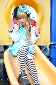 Rating: Safe Score: 0 Tags: 1girl blonde_hair bow dress hair_bow long_hair phone photo shinku sitting solo striped striped_legwear thighhighs traditional_media User: admin