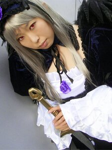 Rating: Safe Score: 0 Tags: 1girl choker dress flower hood lace lips long_hair long_sleeves purple_flower red_eyes rose solo suigintou umbrella veil User: admin