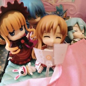 Rating: Safe Score: 0 Tags: blonde_hair blue_hair closed_eyes doll long_sleeves multiple_girls open_book shinku solo User: admin