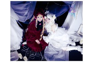 Rating: Safe Score: 0 Tags: 2girls blonde_hair blue_eyes boots curtains dress flower hair_ornament long_hair multiple_cosplay multiple_girls red_dress sitting tagme User: admin