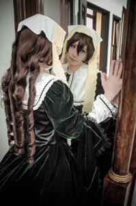 Rating: Safe Score: 0 Tags: 2girls brown_hair curtains dress hat indoors long_hair long_sleeves multiple_girls solo standing suiseiseki veil User: admin