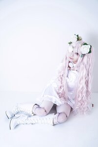 Rating: Safe Score: 0 Tags: 1girl boots flower hair_flower hair_ornament kirakishou long_hair monster_girl pink_hair sitting solo white_flower white_hair white_theme User: admin