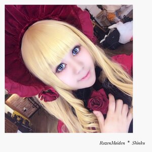 Rating: Safe Score: 0 Tags: 1girl artist_name bangs blonde_hair blue_eyes bonnet close-up eyelashes flower hat lips long_hair looking_at_viewer photo pink_rose portrait red_rose rose shinku smile solo User: admin