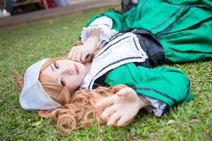 Rating: Safe Score: 0 Tags: 1girl blonde_hair blue_eyes blurry blurry_foreground depth_of_field dress grass green_dress long_hair looking_at_viewer lying outdoors photo solo suiseiseki User: admin