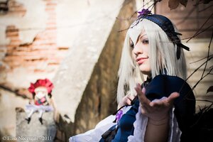Rating: Safe Score: 0 Tags: 2girls auto_tagged blurry blurry_background blurry_foreground depth_of_field dress long_hair multiple_girls photo pink_hair solo suigintou watermark User: admin