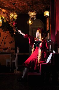 Rating: Safe Score: 0 Tags: 1girl blonde_hair bow candle candlestand chandelier dress hair_bow indoors lamp lantern shinku shoes solo standing User: admin