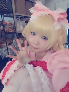 Rating: Safe Score: 0 Tags: 1girl alice_margatroid blonde_hair blue_eyes dress frills hinaichigo looking_at_viewer short_hair solo upper_body User: admin
