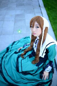 Rating: Safe Score: 0 Tags: 1girl blue_eyes blurry brown_hair dress long_hair long_sleeves mouth_hold solo suiseiseki User: admin