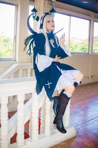 Rating: Safe Score: 0 Tags: 1girl blue_eyes boots dress feathers hair_ornament indoors knee_boots long_hair sitting solo suigintou white_hair window User: admin